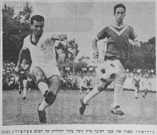 חיים נוריאלי (משמאל) מקדים את שלום פטרבורג