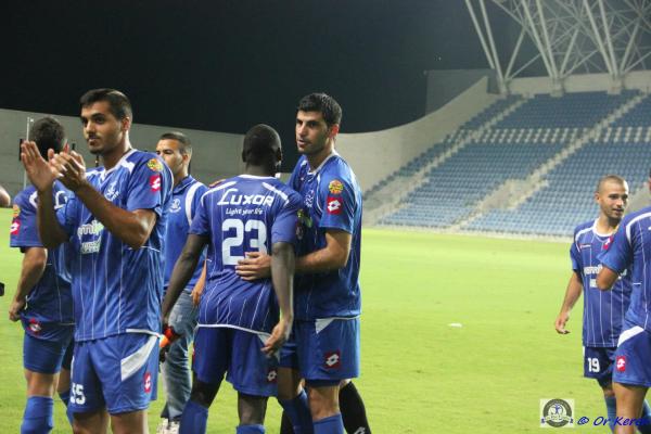 2012/13 - טוטו - מחזור 3 - מכבי פתח-תקוה (0:1) - שחקני הפועל פ"ת חוגגים ניצחון בדרבי גביע הטוטו. גיא משפתי משמאל, אסף בן מוחא עם דומיניק וואסי מימין
