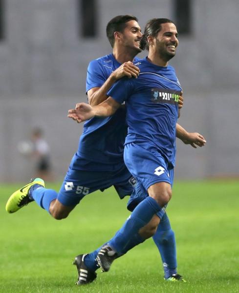 2013/14 - מחזור 10 - הכח רמת-גן (1:3) - ליאור אסולין חוגג את השער השלישי של הפועל פ"ת (צילום: אורן אהרוני, ynet)