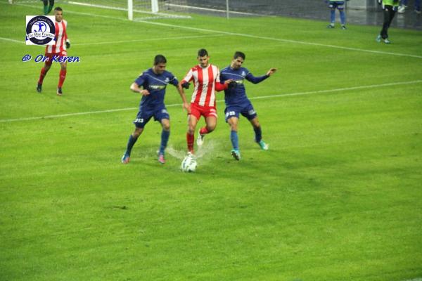 2013/14 - מחזור 15 - הפועל נצרת-עילית (0:3) - יוגב בן סימון ודור אזולאי מנסים להטביע שחקן נצרת עיליתי